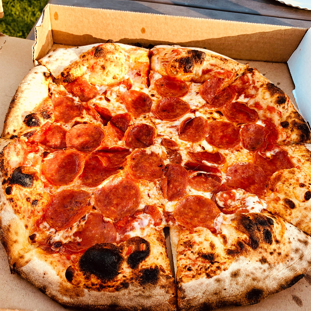 Pearl with the wife getting pizza out on the farm at Pizzas and Cream Nebo West Virginia